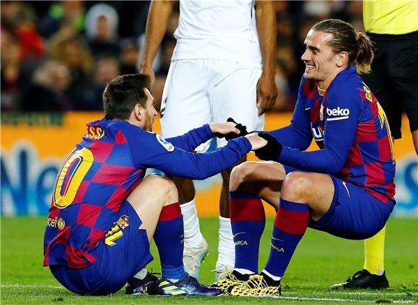 جريزمان وميسي