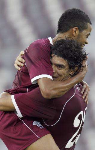 2010-12-22t162636z_01_qat01_rtridsp_3_soccer-friendly_reuters