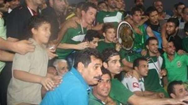 لاعبو الشرطة يحتفلون بلقب 2013 - 2014