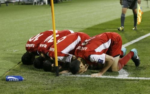 2011-01-132011-01-13t183347z_01_ac606_rtridsp_3_soccer-asian_reuters