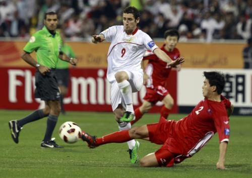 2011-01-152011-01-15t143142z_01_ac117_rtridsp_3_soccer-asian_reuters