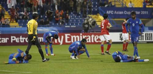 2011-01-182011-01-18t145046z_01_ac216_rtridsp_3_soccer-asian_reuters