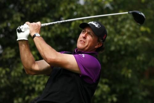 2010-11-05t055726z_01_sha103_rtridsp_3_golf-champions_reuters