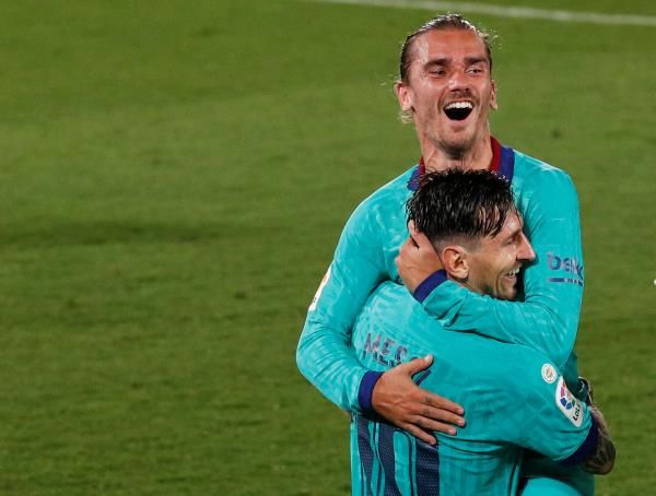 جريزمان وميسي