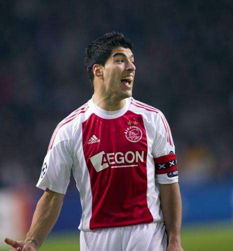 2010-11-23t210838z_01_ams12_rtridsp_3_soccer-champions_reuters