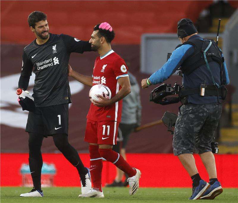 أليسون بيكر ومحمد صلاح