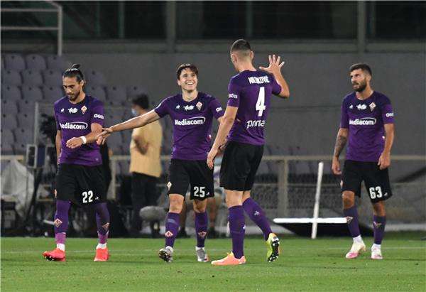 كييزا مع فريقه