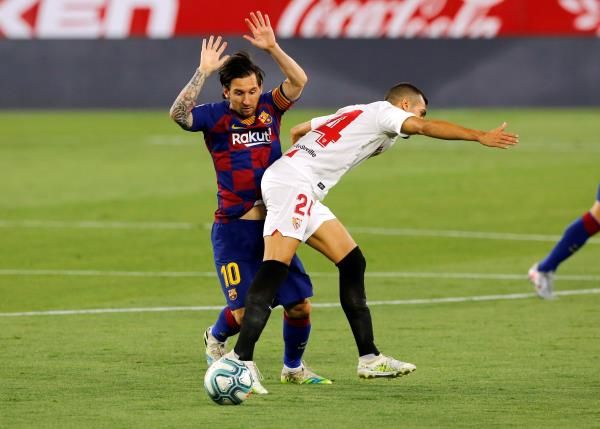 جانب من لقاء سابق بين برشلونة وإشبيلية