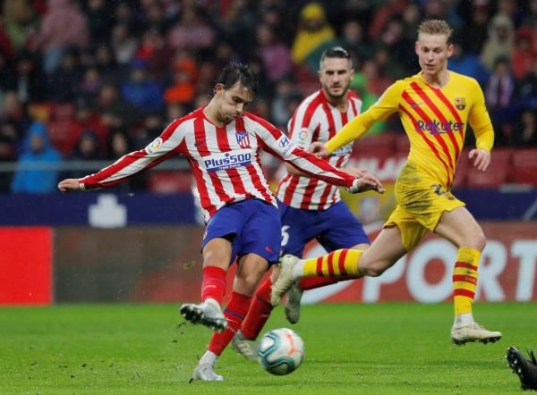 من مباراة سابقة بين برشلونة وأتلتيكو مدريد