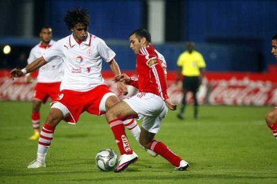 عماد متعب - يمين - 