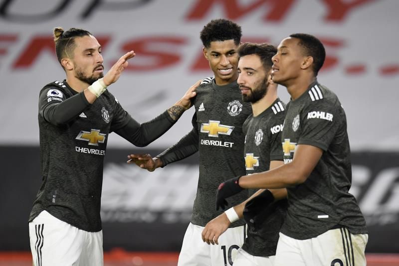 راشفورد مع لاعبي مانشستر يونايتد